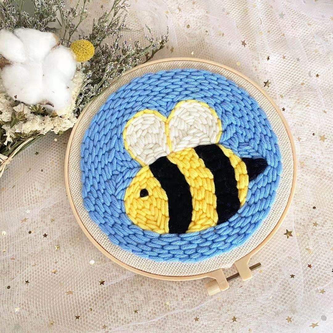 Garden Bumblebee Punch Needle Kit - yellow and black bumblebee design on a light blue background