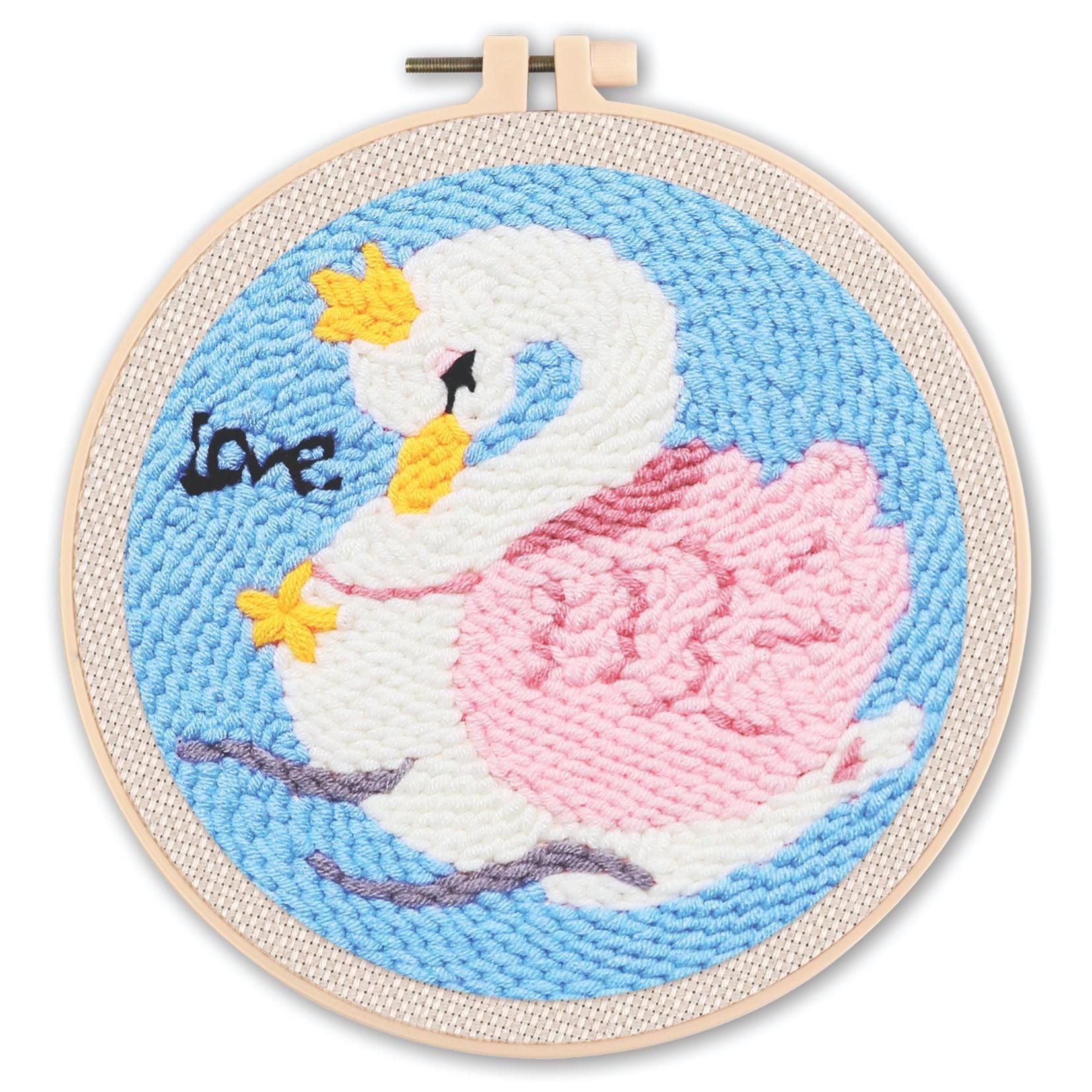 Golden Swan Lake Punch Needle Kit - pink and white swan with a gold crown on a blue background