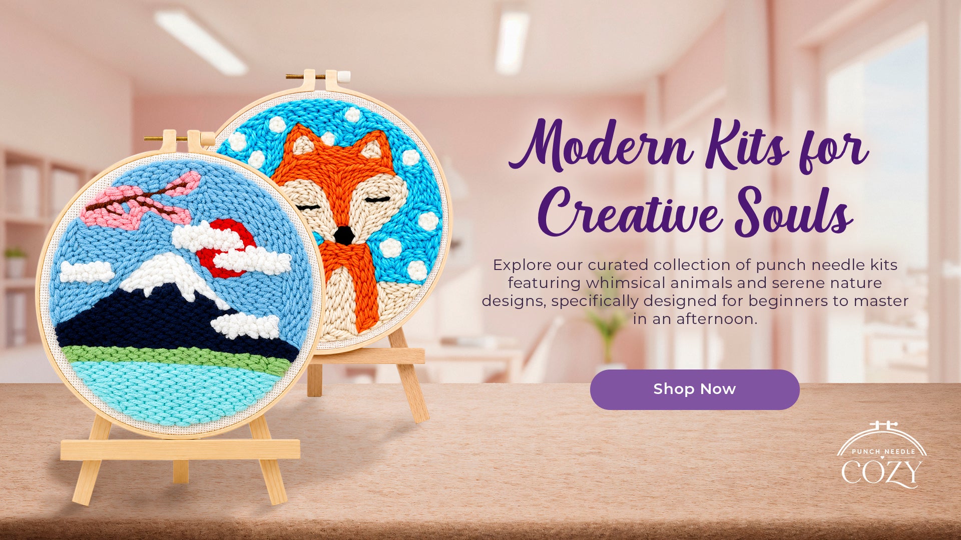 Two punch needle kits featuring a fox and mountain design on a wooden surface with a shop now call to action
